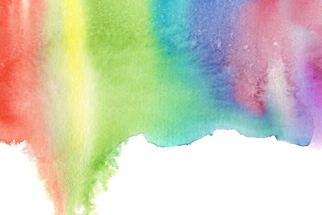 Ein regenbogenfarbiger Verlauf auf weißer Fläche